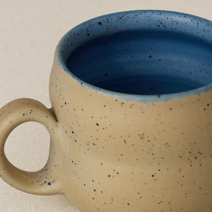 Close-up details of hand-thrown mug by Rookwood
