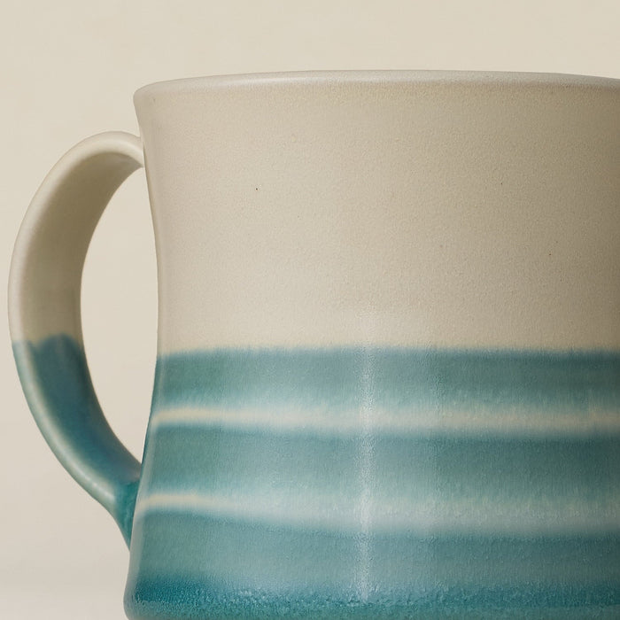 Close-up details of hand-thrown mug by Rookwood