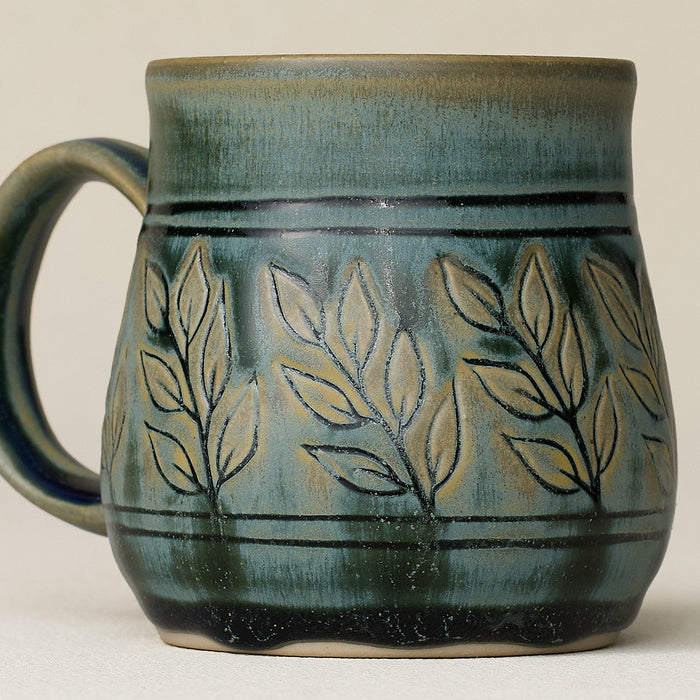 Close-up details of hand-thrown mug by Rookwood