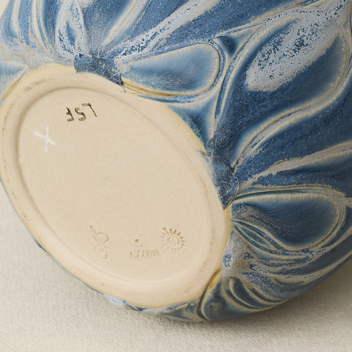 Close-up details of the one-of-a-kind canister.