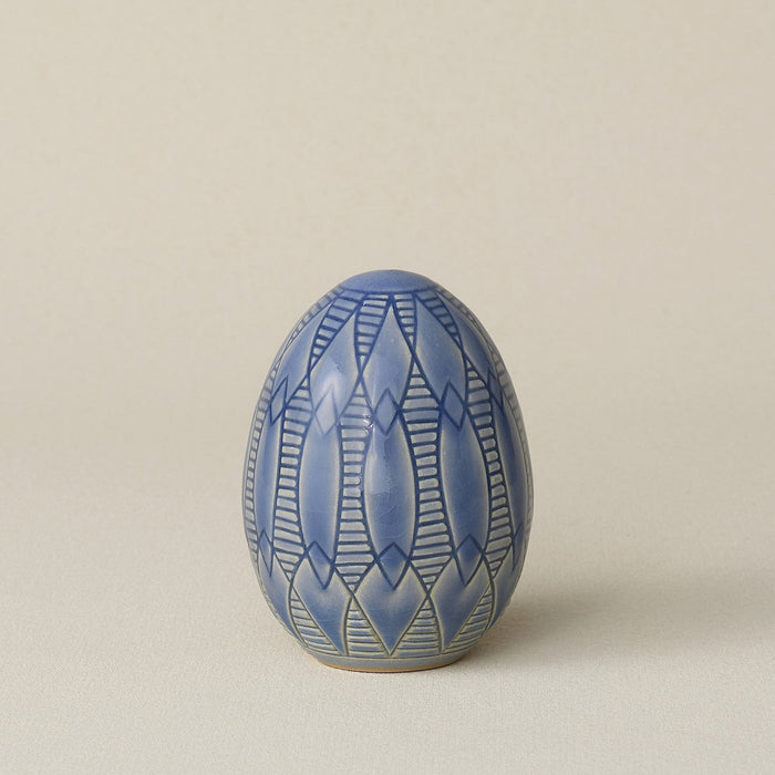 Handcrafted ceramic egg by Rookwood Pottery