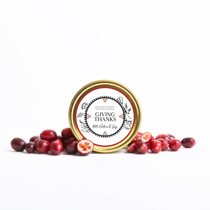 LODGE's 8oz travel tin candle in the scent Giving Thanks.