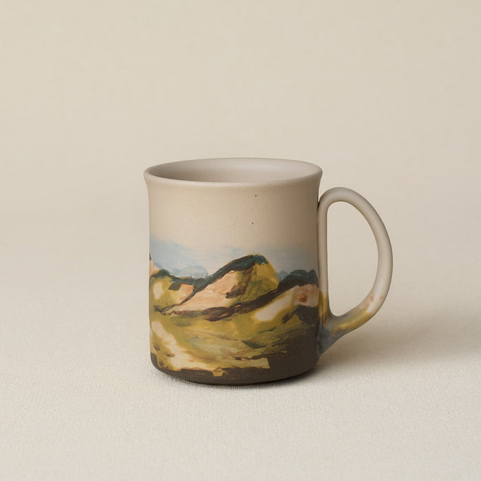 Hand-thrown ceramic mug by Rookwood Pottery