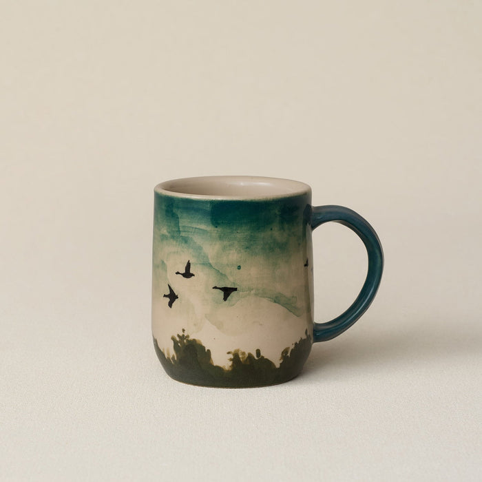 Hand-thrown ceramic mug by Rookwood Pottery