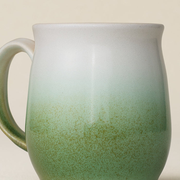 Close-up details of hand-thrown mug by Rookwood