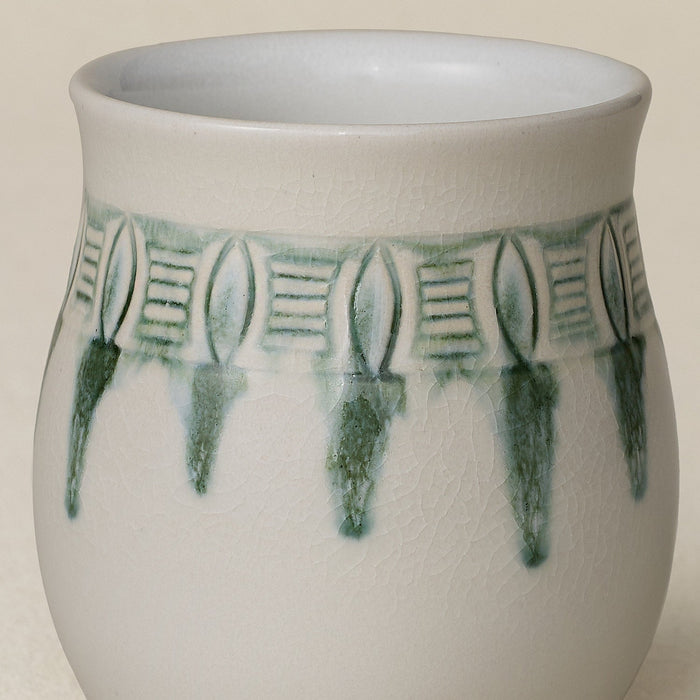 Close-up details of hand-thrown mug by Rookwood