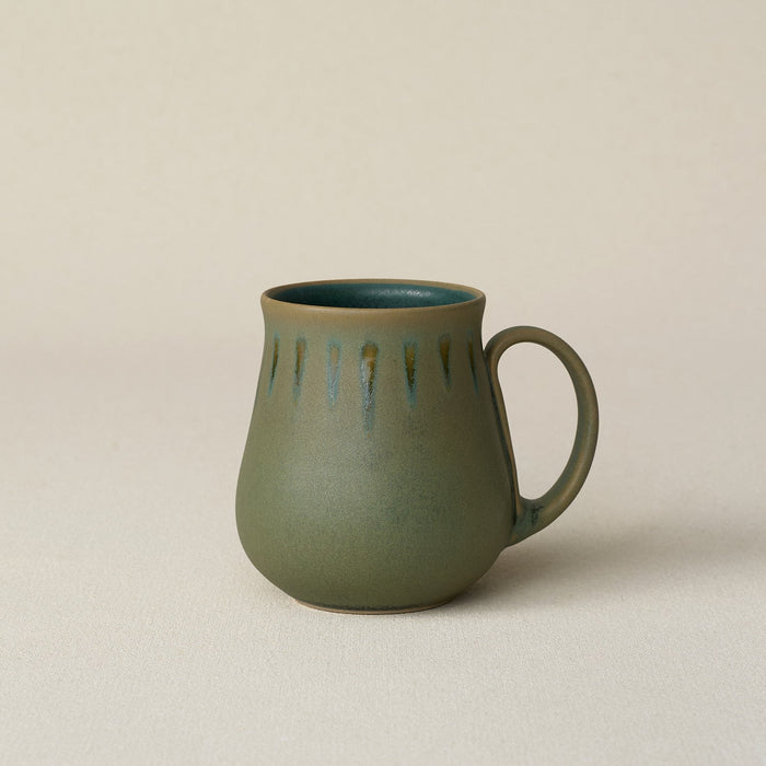 Hand-thrown ceramic mug by Rookwood Pottery