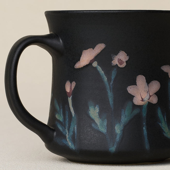 Close-up details of hand-thrown mug by Rookwood