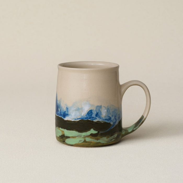Hand-thrown ceramic mug by Rookwood Pottery