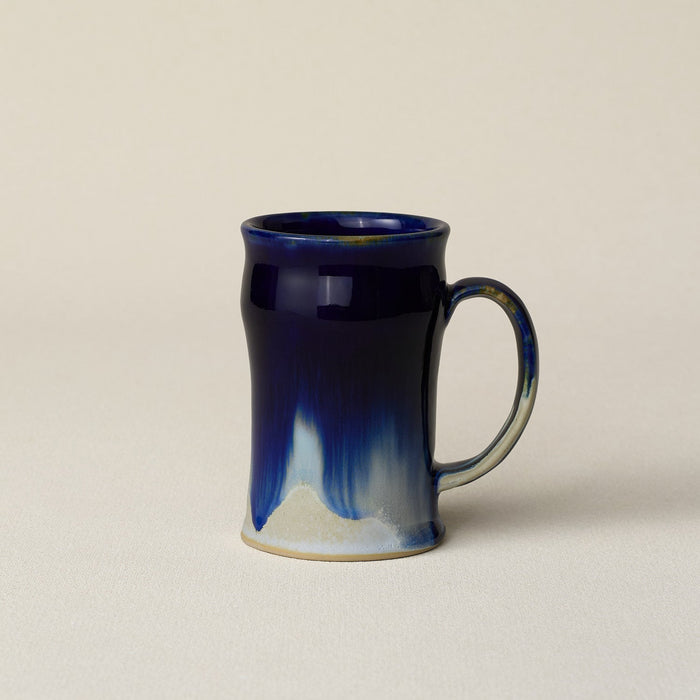 Hand-thrown ceramic mug by Rookwood Pottery