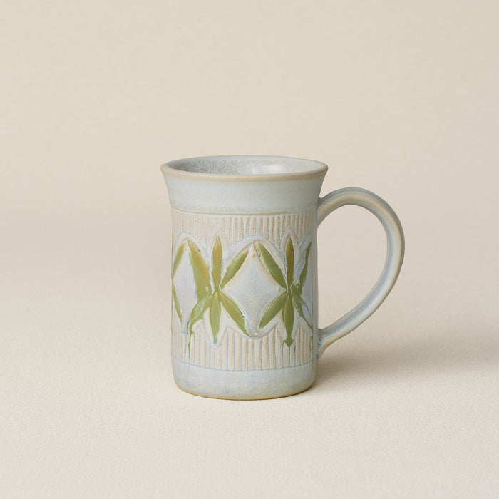 Hand-thrown ceramic mug by Rookwood Pottery