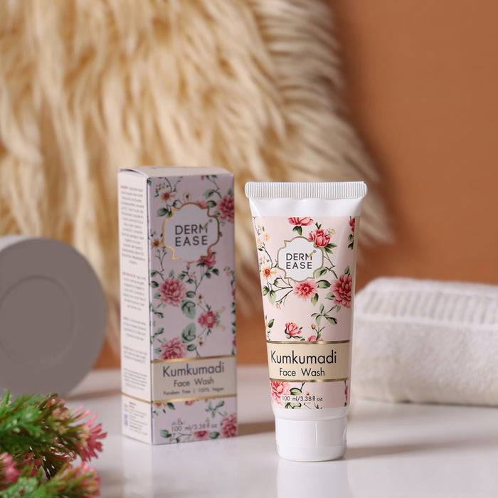 Derm Ease Kumkumadi Face Wash with packaging on a blurred background