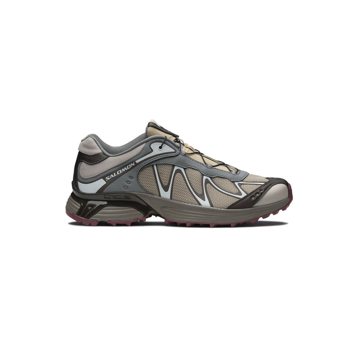 Salomon running shoe on a white background