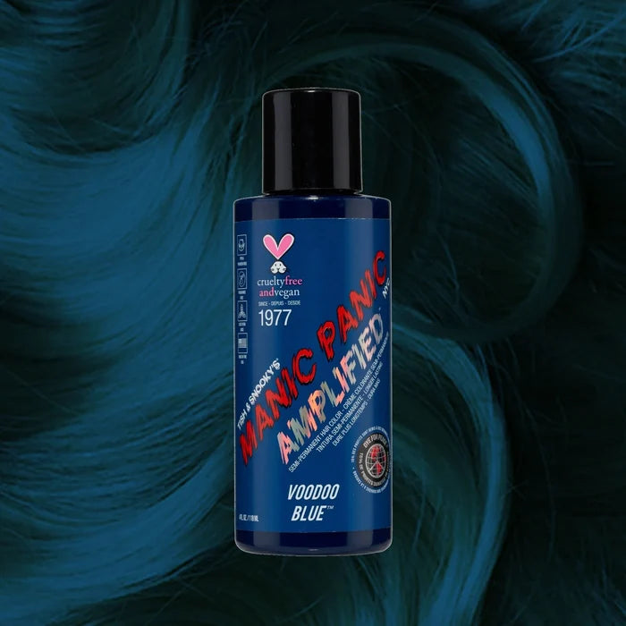 Manic Panic Amplified Voodoo Blue hair dye bottle on teal-blue wavy hair background